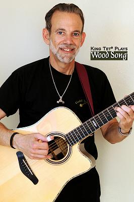 King Tet plays Wood Song guitars