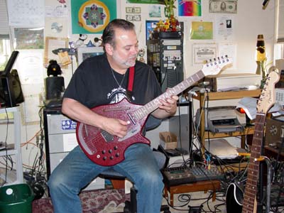 Eric Van der Wyk plays the electric Sitar